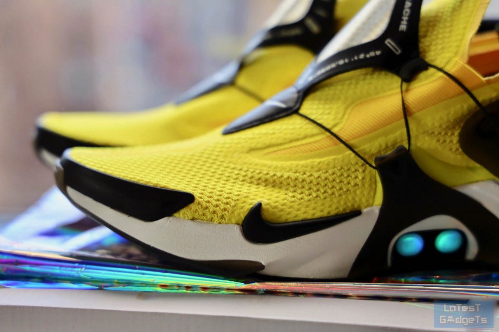 Blue LED lights on the yellow Nike  Adapt Huarache