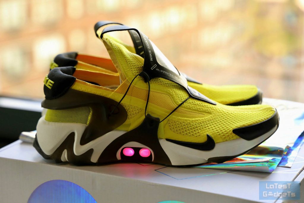 Side view of the Huarache Adapt self lacing shoes in yellow